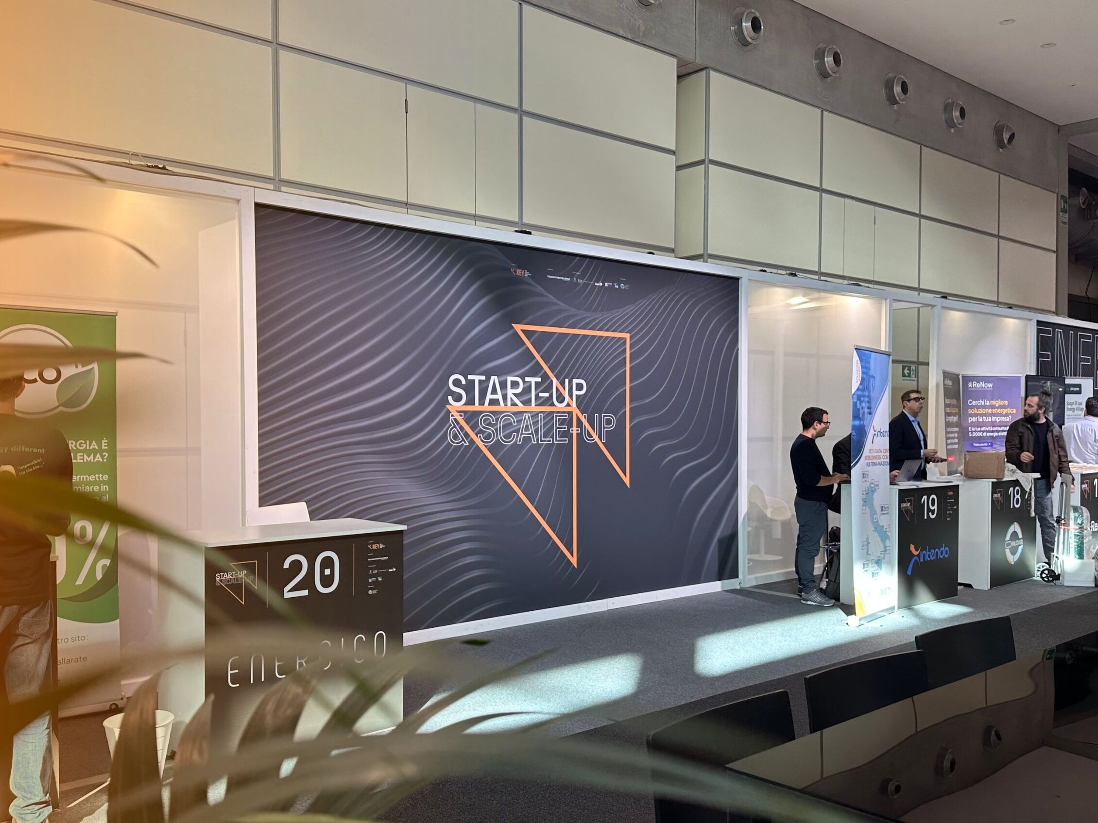 Start-Up & Scale-Up area with large wall posters and staff at work